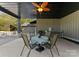 Covered patio with table and chairs, great for outdoor dining at 5070 Woodleaf Rd, Salisbury, NC 28147