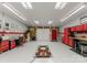 Organized garage with car lift and plenty of storage at 5070 Woodleaf Rd, Salisbury, NC 28147