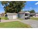 View of detached garage and storage shed in the backyard at 5070 Woodleaf Rd, Salisbury, NC 28147