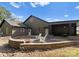 Outdoor patio area with fire pit and seating at 5070 Woodleaf Rd, Salisbury, NC 28147