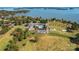 Aerial view of the golf course and lakefront at 806 Lake Mist Dr, Stanley, NC 28164