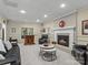 Spacious basement with a fireplace, bar, and seating area at 806 Lake Mist Dr, Stanley, NC 28164