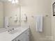 Bathroom with vanity, mirror, and ample storage at 806 Lake Mist Dr, Stanley, NC 28164