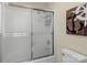 Clean bathroom with shower/tub combo and nautical decor at 806 Lake Mist Dr, Stanley, NC 28164