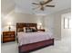 Bright bedroom featuring a king-size bed and nightstands at 806 Lake Mist Dr, Stanley, NC 28164