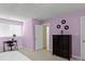 Bedroom with desk, dresser and window with blinds at 806 Lake Mist Dr, Stanley, NC 28164