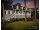 Two-story house with a large front porch and landscaping at 806 Lake Mist Dr, Stanley, NC 28164