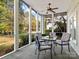 Relaxing screened porch with seating area, perfect for outdoor enjoyment at 806 Lake Mist Dr, Stanley, NC 28164