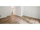 Bedroom with hardwood floors and a large closet at 9424 Lexington Cir # F, Charlotte, NC 28213
