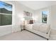 Cozy bedroom with neutral tones and ample natural light at 2304 Catalina Ave, Charlotte, NC 28206