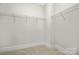 Walk-in closet with wire shelving for ample storage at 2304 Catalina Ave, Charlotte, NC 28206