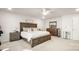 Main bedroom with king-size bed, dresser, and ceiling fan at 3878 Fairlady Ln, Fort Mill, SC 29707