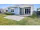 Manicured backyard with stone patio and screened-in porch perfect for outdoor enjoyment at 6296 Raven Rock Dr # 725, Denver, NC 28037