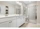 Bright bathroom with double vanity and glass enclosed shower at 6296 Raven Rock Dr # 725, Denver, NC 28037