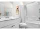 Bright bathroom featuring a shower-tub combo and a white vanity with chrome finishes at 6296 Raven Rock Dr # 725, Denver, NC 28037