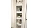 Organized linen closet with ample shelf space for towels and decorative plants at 6296 Raven Rock Dr # 725, Denver, NC 28037