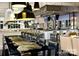 Elegant restaurant interior with upscale seating and bar area featuring stylish lighting and modern decor at 6296 Raven Rock Dr # 725, Denver, NC 28037