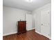 Bedroom with wood floors and a dresser at 797 Chief Thomas Rd, Harmony, NC 28634