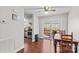 Dining area with wood floor, view of deck and kitchen at 797 Chief Thomas Rd, Harmony, NC 28634