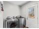 Laundry room with washer, dryer, and exterior access at 797 Chief Thomas Rd, Harmony, NC 28634