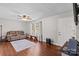 Living room with hardwood floors and brown couch at 797 Chief Thomas Rd, Harmony, NC 28634