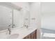 Stylish bathroom featuring double sinks, a large mirror, and contemporary fixtures at 817 Terra Dr, Tega Cay, SC 29708