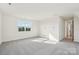 Bright, expansive bedroom with neutral carpet and natural light at 817 Terra Dr, Tega Cay, SC 29708