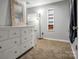 Neutral bedroom featuring a dresser, mirror, and carpet at 914 Wyke Rd, Shelby, NC 28150