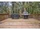 Wood deck featuring two BBQ grills and a wood perimeter railing for outdoor cooking and relaxing at 914 Wyke Rd, Shelby, NC 28150