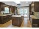 Well-equipped kitchen with stainless steel appliances, granite countertops and center island at 914 Wyke Rd, Shelby, NC 28150