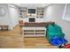 Open living room featuring wood flooring and colorful play area at 914 Wyke Rd, Shelby, NC 28150