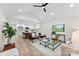 Bright and airy living room with hardwood floors, and comfortable seating at 2443 Myrtle Ave, Gastonia, NC 28052