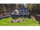 Aerial view of the front of the home with a green lawn and partial shade coverage at 360 Lauren Pines Dr, York, SC 29745