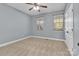 Bright bedroom featuring neutral carpet, ceiling fan, and natural light from the two windows at 360 Lauren Pines Dr, York, SC 29745