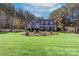 House exterior showing a two-story home with a front porch and well-maintained lawn at 360 Lauren Pines Dr, York, SC 29745