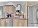 Well-lit kitchen featuring stainless steel appliances, granite countertops, and arched window at 360 Lauren Pines Dr, York, SC 29745