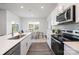 Modern kitchen with stainless steel appliances and eat-in dining area at 362 Brinkley Dr # 142, Kings Mountain, NC 28086