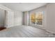 Charming bedroom with window and neutral wall colors at 513 N Graham St # 3D, Charlotte, NC 28202