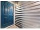 Inviting entryway with blue door and stylish doormat at 513 N Graham St # 3D, Charlotte, NC 28202