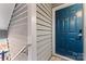 Blue front door with a modern handle and keyless entry at 513 N Graham St # 3D, Charlotte, NC 28202