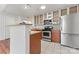 Kitchen with granite countertops and stainless steel appliances at 513 N Graham St # 3D, Charlotte, NC 28202