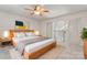 Spacious main bedroom with ceiling fan and loft view at 513 N Graham St # 3D, Charlotte, NC 28202