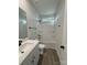 Clean bathroom with tub, shower, and modern vanity at 723 E Memorial Hwy, Harmony, NC 28634