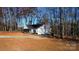 Newly built home with driveway and wooded setting at 723 E Memorial Hwy, Harmony, NC 28634