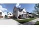 New construction home with grey and white siding, garage, porch, and well-manicured lawn with landscaping at 809 Terra Dr, Tega Cay, SC 29708