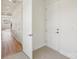 Hallway with tile floor and white doors leading to various rooms throughout the home at 809 Terra Dr, Tega Cay, SC 29708