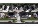 Aerial view of modern homes, some featuring solar panels, neatly arranged with well-manicured landscaping at 821 Terra Dr, Tega Cay, SC 29708