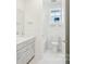 Bright and airy bathroom featuring a vanity with white marble countertop and shower-tub combo at 821 Terra Dr, Tega Cay, SC 29708