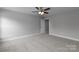 Bright, spacious bedroom features plush carpeting and a ceiling fan, providing a comfortable and inviting atmosphere at 2014 Crown Point Dr # 2008-B, Albemarle, NC 28001