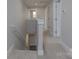 Upstairs hallway featuring plush carpeting, leading to several rooms, providing a comfortable and quiet transition between spaces at 2014 Crown Point Dr # 2008-B, Albemarle, NC 28001